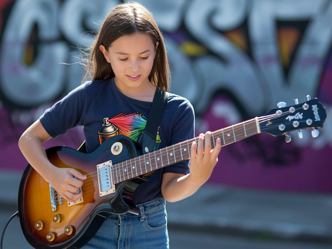 Beautiful girl playing guitar